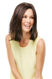 Laughing woman with hair loss wearing a brunette Elle Synthetic Elle wig with a lace front 