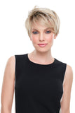 young woman with progressive stage hair loss showing her short blonde Evan synthetic wig 