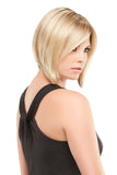 Female with advanced stage hair loss covering her hair with her Victoria synthetic wig 