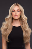 Young woman with Alopecia wearing her light density Remy human hair Kim wig 