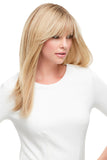 Young woman with hair loss showing a light blonde Lea Remy human hair wig 
