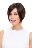 Lady with progressive hair loss showing her Brunette Posh wig in the Mono Top collection 