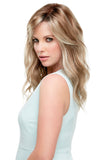Female with hair loss wearing the long wavy blonde Rachel Smartlace wig by Jon Renau 