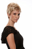 Model with hair fall showing her blonde short style Simplicity Petite wig by Jon Renau