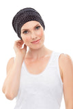 Woman with progressive hair loss wearing The Softie with double bamboo lining 