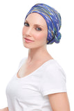 Female with Alopecia covering her head with a blue Softie Wrap by Jon Renau 