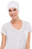 Happy woman with hair loss wearing The Softie in white from Fascinations wigs in Cape Town 