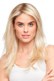 Young woman with Alopecia is covering her hair in a Blond long Alessandra wig 