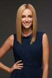 Young woman with advanced hair loss showing her sleek golden blonde Gwyneth wig by Jon Renau