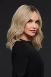 Smiling woman with hair loss wearing the hand-tied Gwyneth wig 