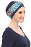 Smiling woman with complete hair loss wearing her Softie Accent from Fascinations 