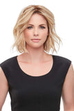 Female with thinning hair wearing the 12 Inch Easipart XL hair topper in Blonde.