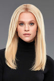 Women wearing blonde hair extensions that measure 16 inches long by 6 inches wide
