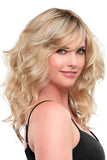 Smiling woman with Alopecia wearing her Alexis wig with a Double Monofilament Cap from Fascinations 