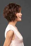Happy woman with balding is wearing her bob style human hair wig in the style called Amalfi