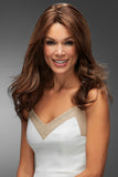 Happy woman with hair loss is wearing a long layered Angie Human hair wig with a lace front 