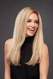 Happy woman with Alopecia Areata covering her head in the Blake Petite wig with a lace front 