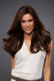 Female with fine hair wearing the long brunette Blake Petite wig 