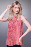 Lady touching her long blonde sienna lite wig made from Remy Human hair