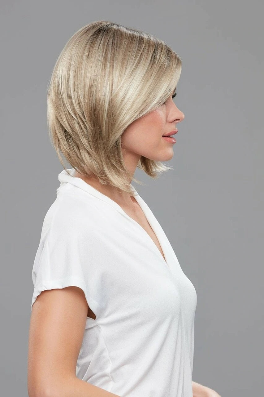 Lady with fine hair wearing a modern bob style Brooklyn wig from Fascinations 