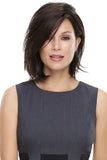 Model with fine hair wearing a brunette synthetic Cameron wig with a hand-tied cap 