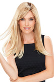 Model with hair loss wearing a long blonde Camilla wig 