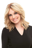 Female with fine hair showing her blonde Cara wig from Fascinations 