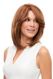 Smiling lady with balding wearing a shoulder length Cara wig from Jon Renau Cape Town 