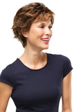 Happy woman with Alopecia is showing her brunette short style Chelsea synthetic wig 