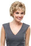 Smiling woman with hair fall is covering her head in a Blonde Chelsea wig 
