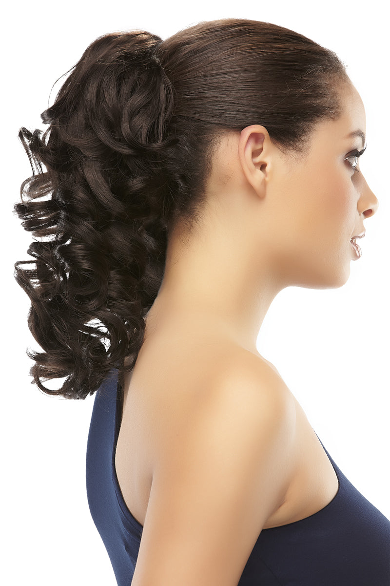 Young woman wearing the Crush curly clip on Crush ponytail from Fascinations 