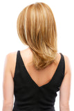 Lady with hair loss showing the back of her Drew wig in a golden blonde colour 