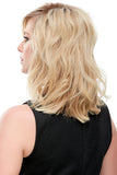 Lady with fine hair showing the back of the 12 Inch human hair topper in the style Easipart 