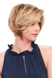 Model with Alopecia wearing a blonde bob style Elisha Petite wig by Jon Renau 