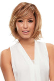 Model with thinning hair is showing her Elizabeth heat friendly synthetic wig by Jon Renau 