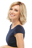 Happy woman with advanced hair loss is wearing a blonde Elizabeth Heat resistant wig 