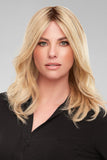 Woman with hair loss is wearing a blonde Eloise 12 Inch Bondable Remy human Hair Topper