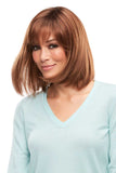 Model with thinning hair is covering her head in the Emilia long bob synthetic wig 