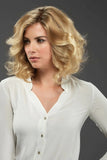 Model with balding showing a blonde Euro Carrie human hair wig 