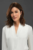 Beautiful woman with fine hair wearing a Euro Carrie wig with a monofilament top and hand-tied back