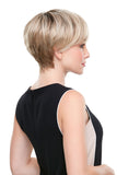 young woman with Alopecia Areata showing her short blonde Evan synthetic wig 