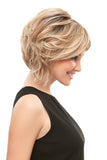 Woman with thinning hair wearing a blonde Eve wig from Fascinations 