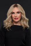 Model with hair loss wearing a light blonde Gwyneth human hair wig 
