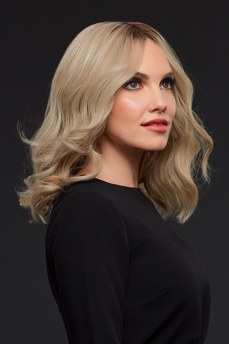 Female with thinning hair wearing a light blonde Gwyneth wig with a lace front 