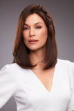 Lady with progressive hair loss showing the shoulder length Remy human hair Gwyneth wig 