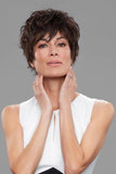 Woman with advanced hair loss wearing a pixie style Halsey wig 