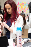 Hair desser having a training session for hand tied wefts