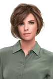 Model with balding wearing a brunette Ignite Large wig from Fascinations 