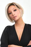 Young woman with advanced hair loss wearing the heat treatable Ignite Petite wig by Jon Renau 
