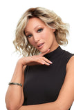 Young woman with progressive hair loss wearing her blonde January Hand Tied Wig
